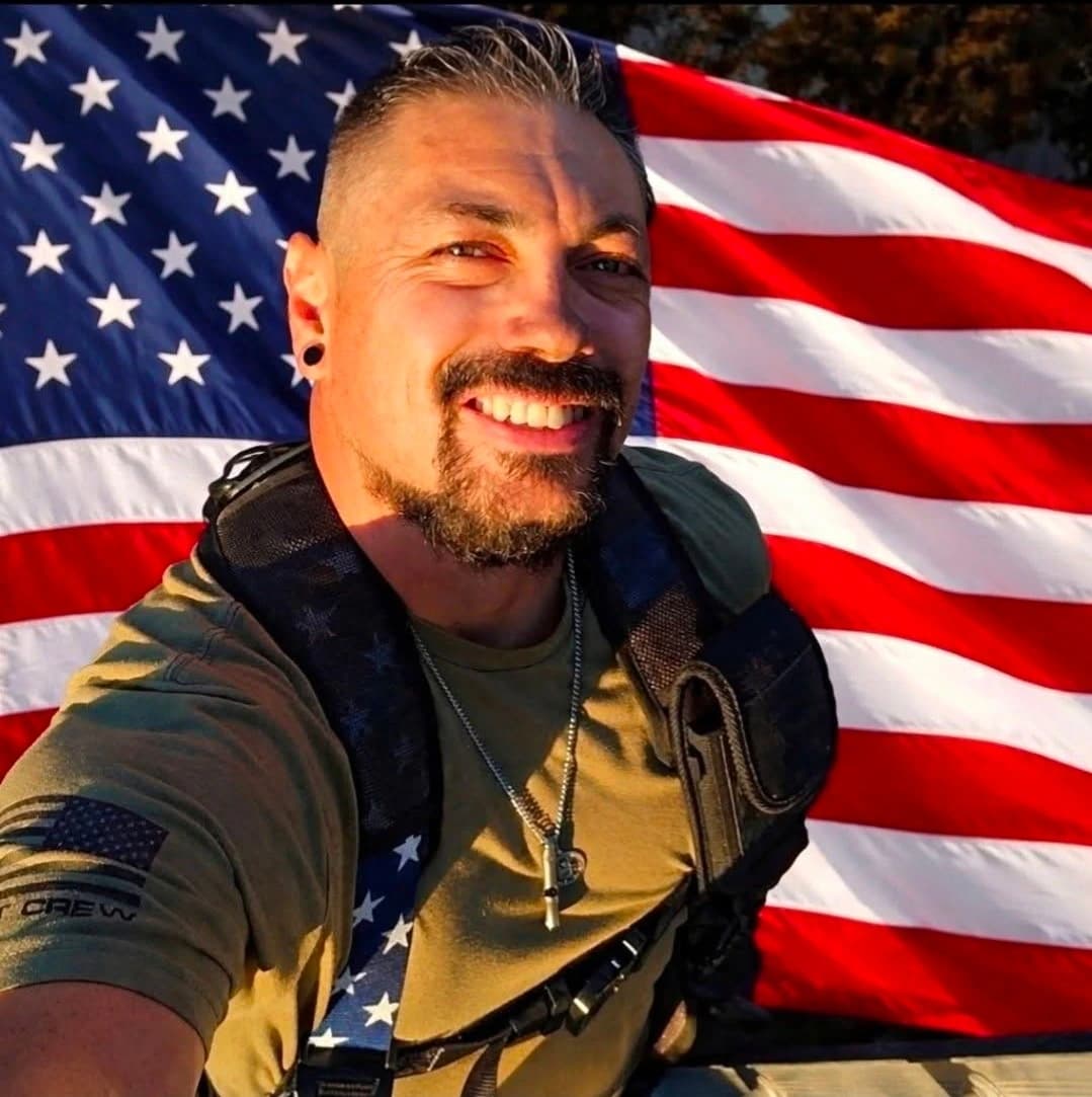 High Society team member in branded attire